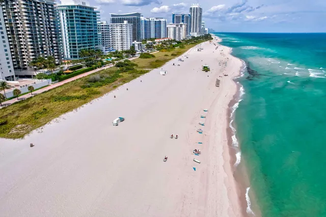 a view of swimming pool from a balcony