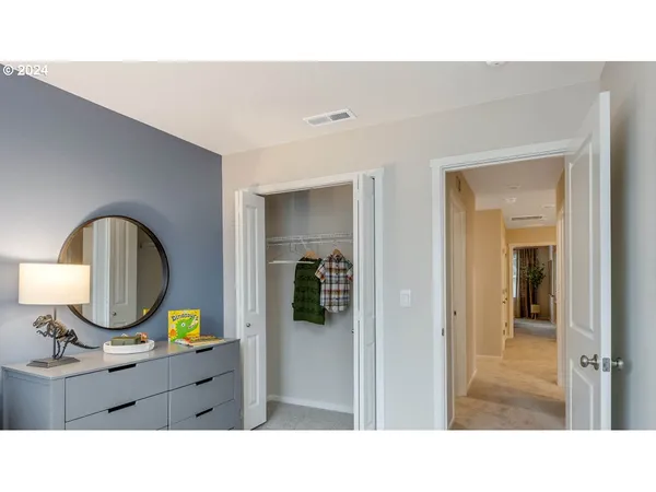 a bathroom with a sink a mirror and a shower