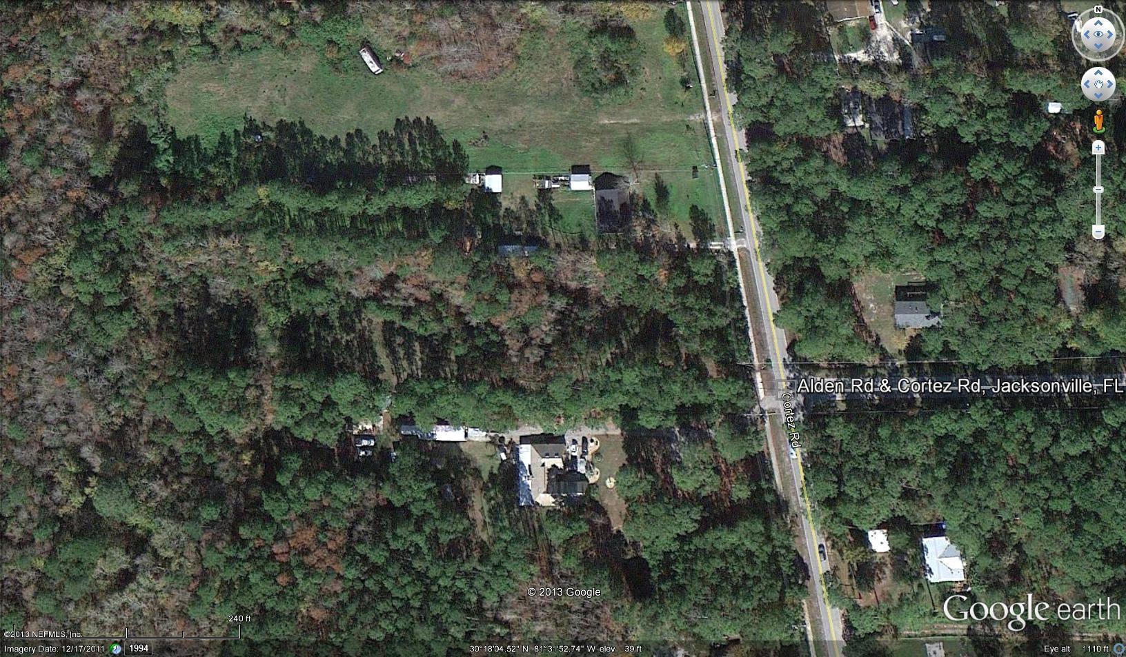 0 Cortez Road Jacksonville, FL 32246 - Photo 2 of 5 an aerial view of residential house with outdoor space and trees all around