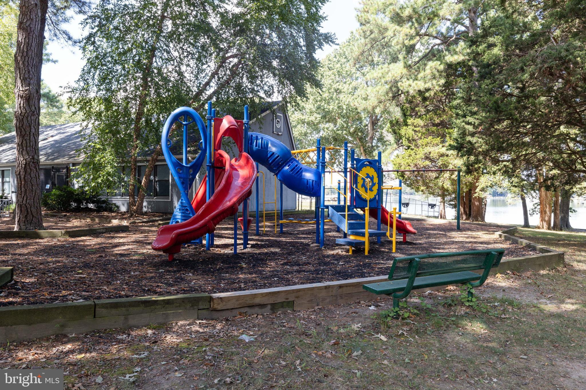 11215 Lord Baltimore Drive Issue, MD 20645 - Photo 27 of 38 Community playground nestled in nature's embrace.