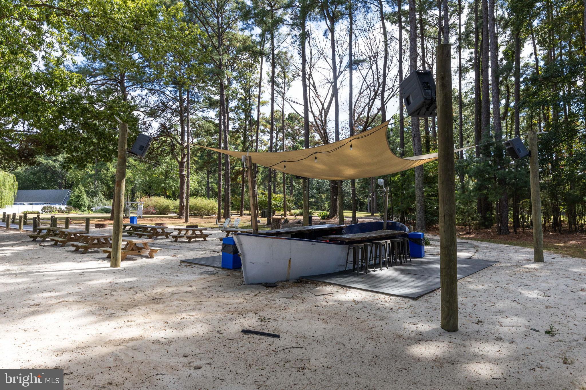 11215 Lord Baltimore Drive Issue, MD 20645 - Photo 30 of 38 Outdoor community gathering space with seating.