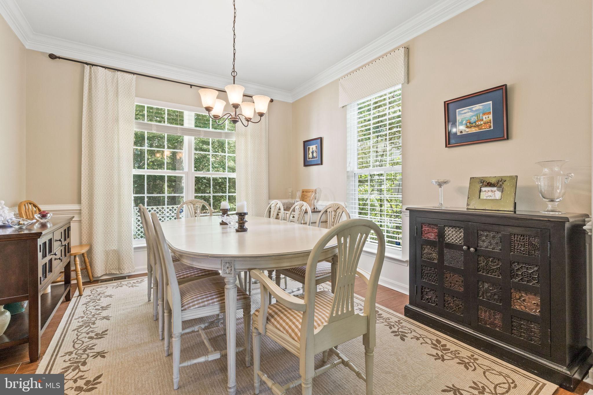 11215 Lord Baltimore Drive Issue, MD 20645 - Photo 6 of 38 Dining Room with crown molding and wainscoting.