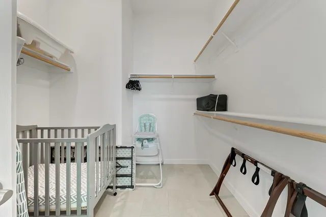 a view of a hallway with stairs