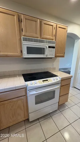 a view of a street with houses