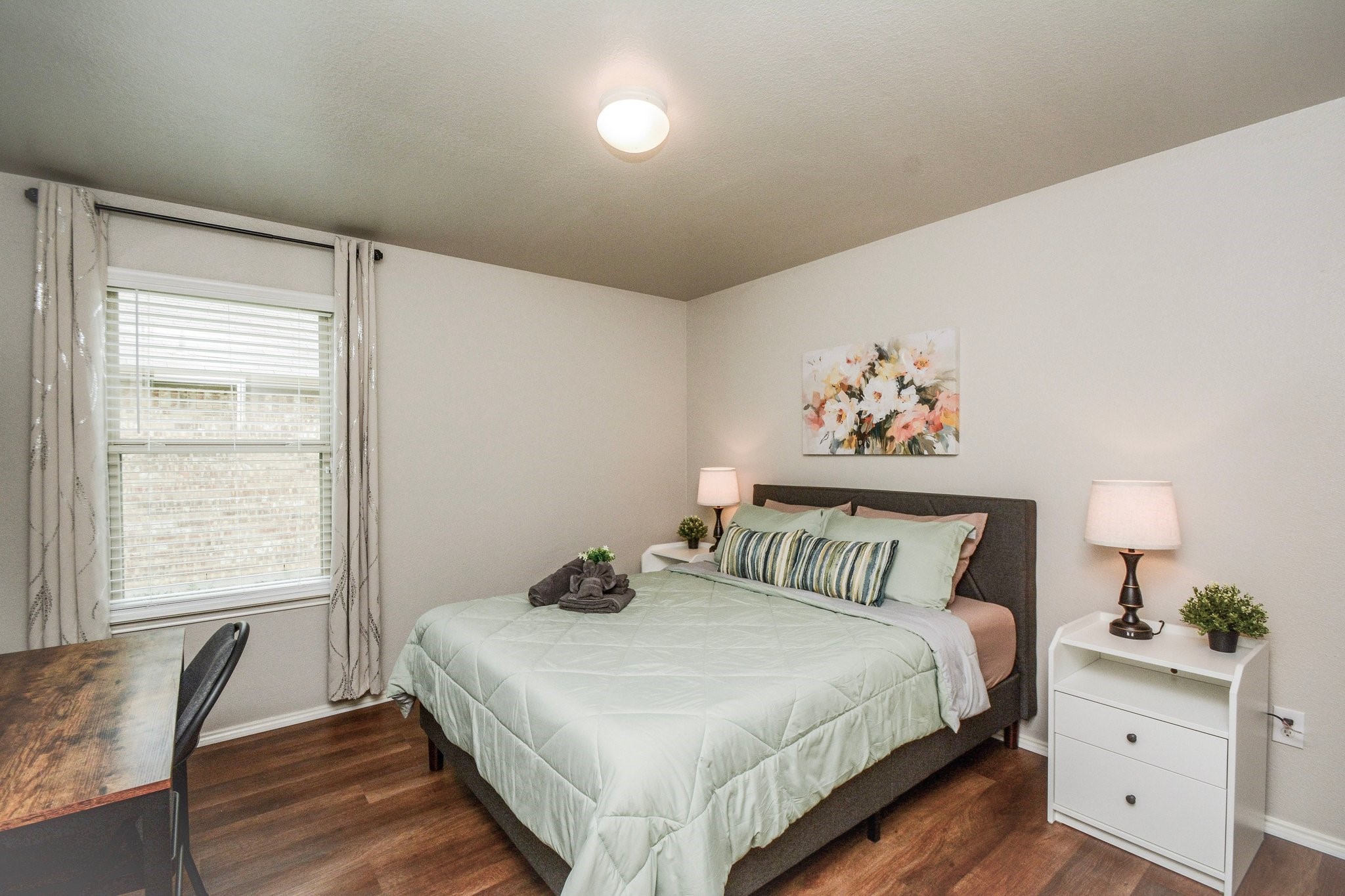 23510 Harrow Fld Lane Spring, TX 77373 - Photo 10 of 18 a bedroom with a bed and a window