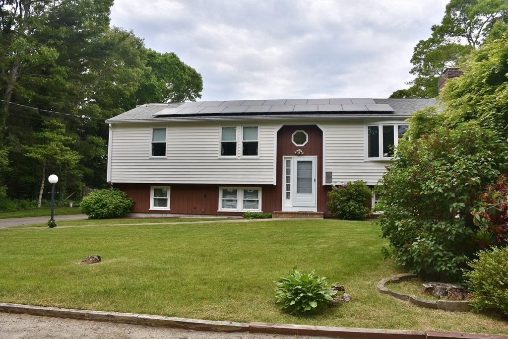 3 Catskill Road Bourne, MA 02532 - Photo 3 of 34 a front view of house with yard and green space