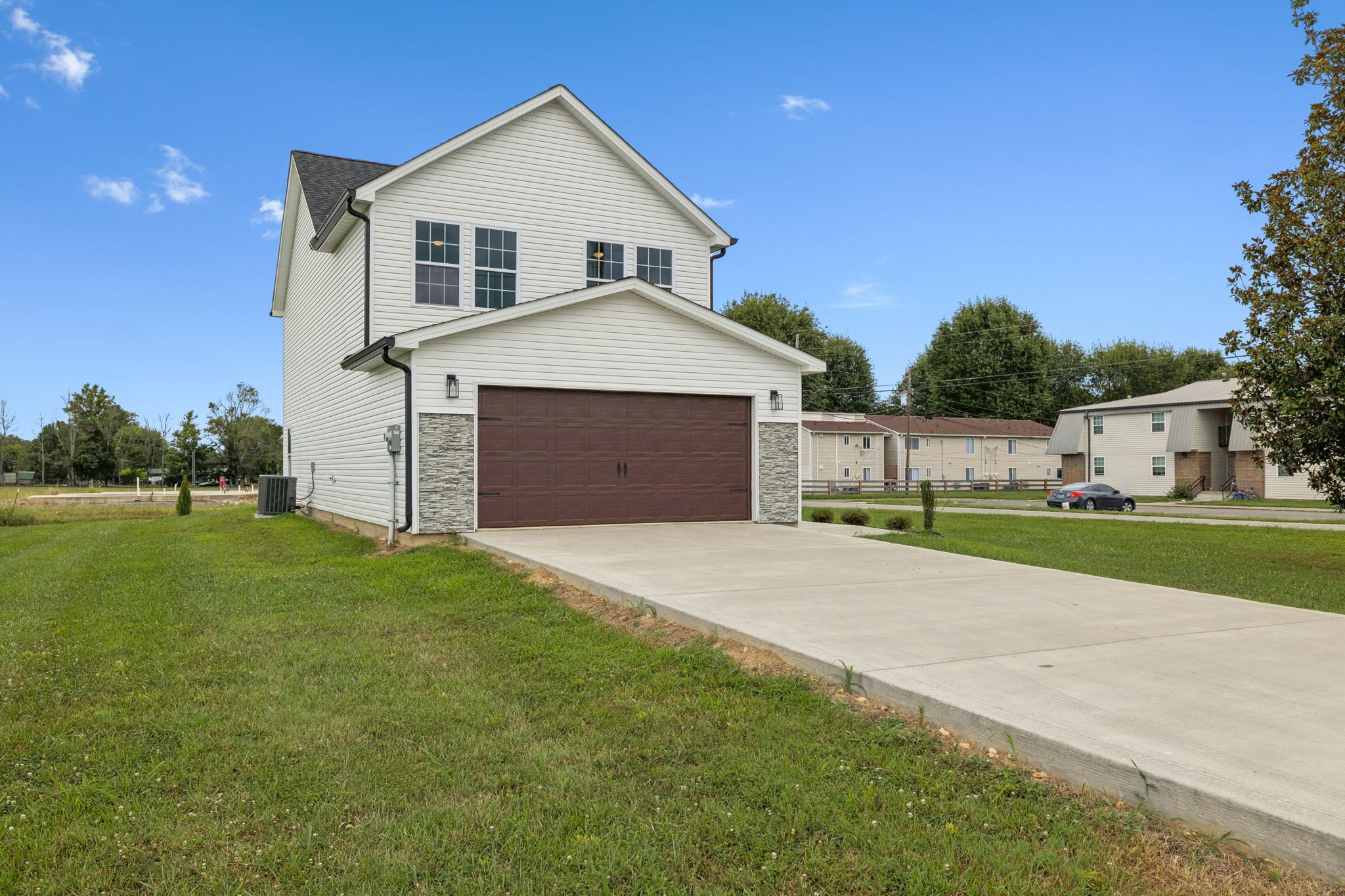 700 Robinson Road Smithville, TN 37166 - Photo 36 of 36 a front view of a house with a yard and garage