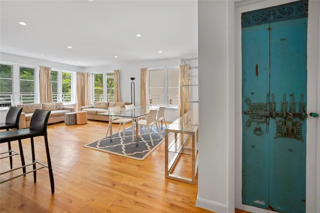 a view of a dining room with furniture window and outside view