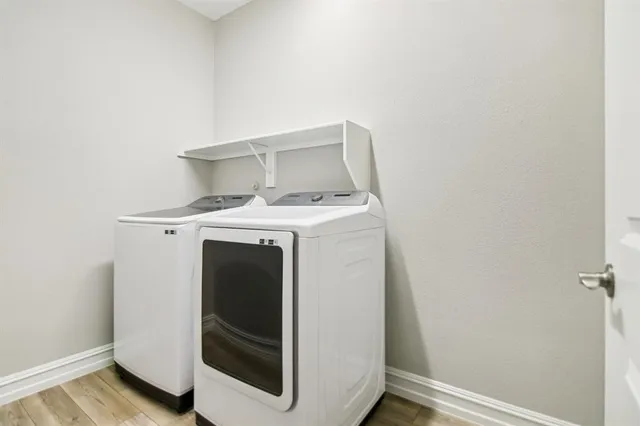 a utility room with dryer and washer