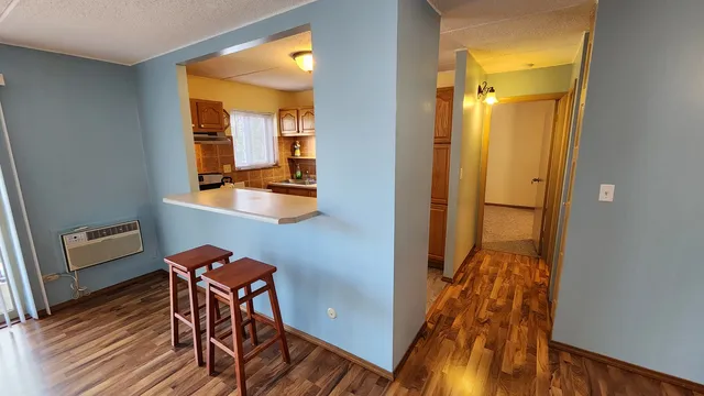 wooden floor and utility room with wooden floor