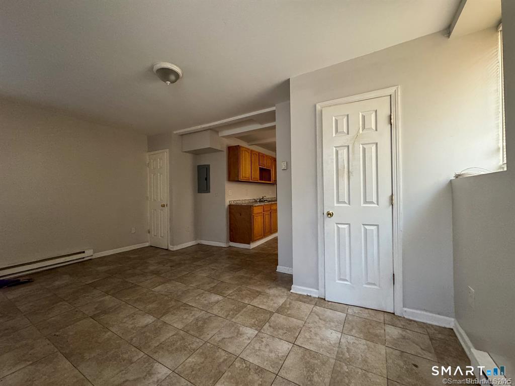 40 Jane Street Bridgeport, CT 06608 - Photo 13 of 30 an empty room with windows