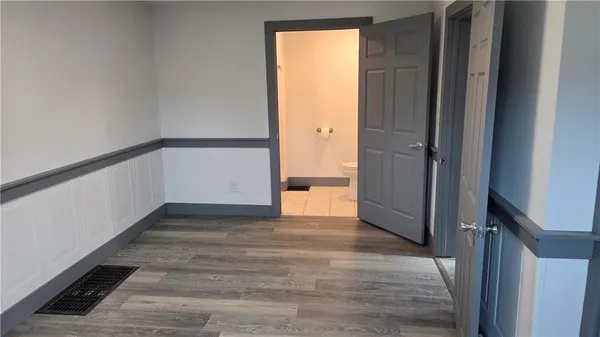 a view of an empty room and window