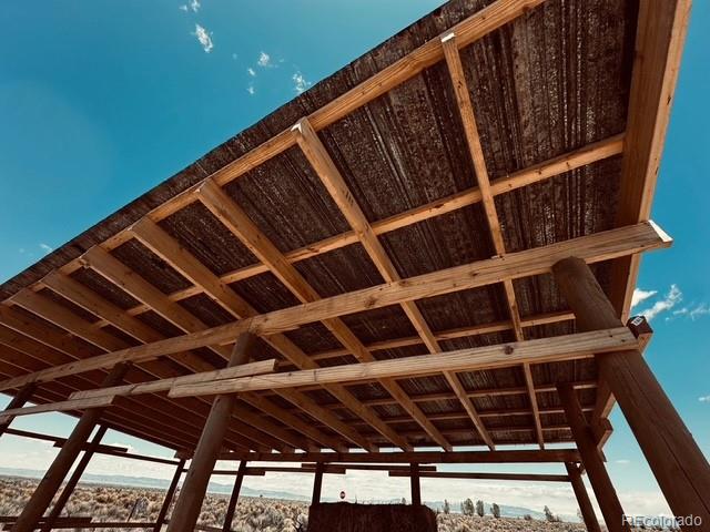 764 Camino Del Rey Crestone, CO 81131 - Photo 3 of 12 a view of staircase with wooden floor and stairs