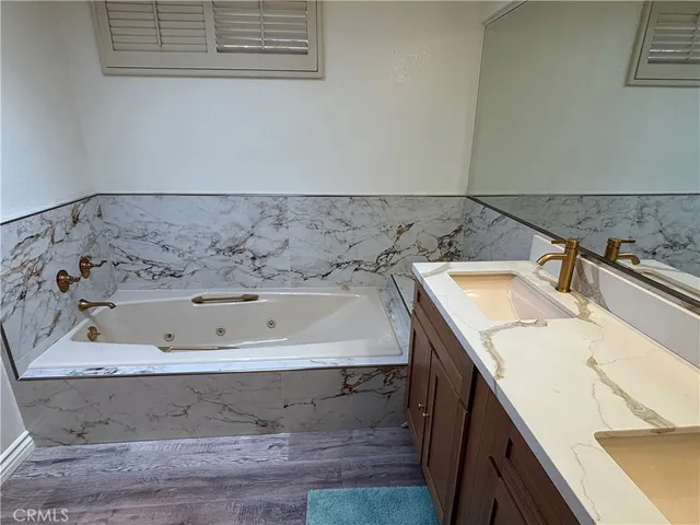 a bathroom with a toilet and a sink