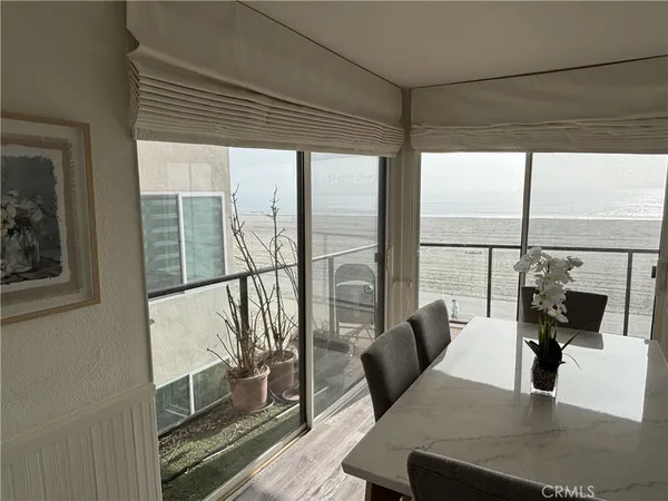 a view of a living room with a large window
