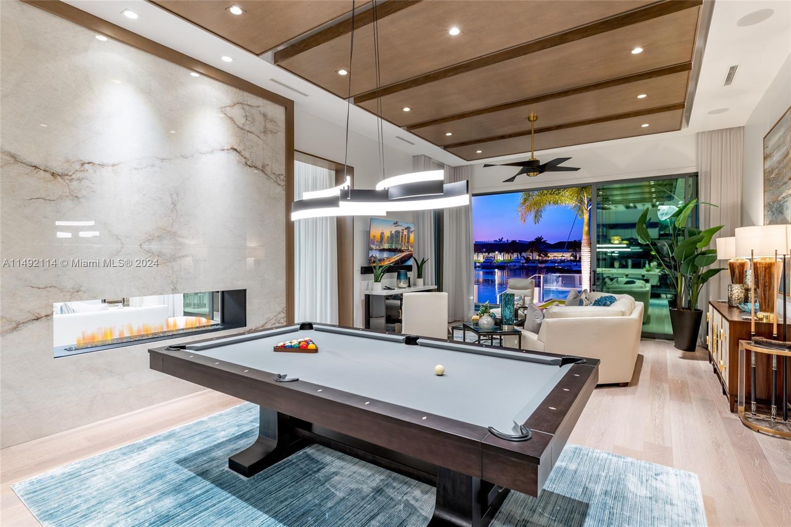 169 West Key Palm Road Boca Raton, FL 33432 - Photo 13 of 27 a room with furniture pool table table and chairs