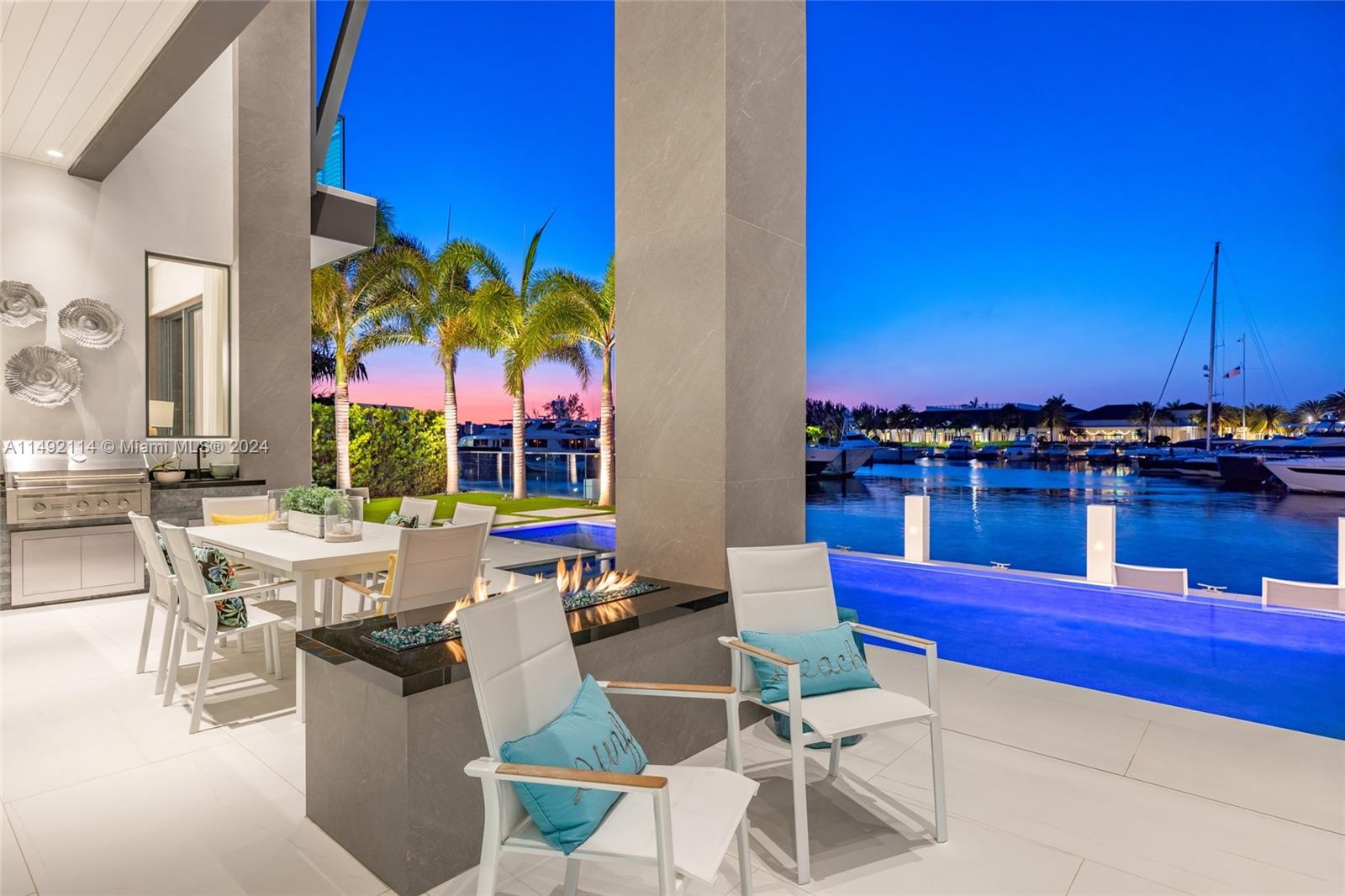 169 West Key Palm Road Boca Raton, FL 33432 - Photo 20 of 27 a view of a chairs and table in patio