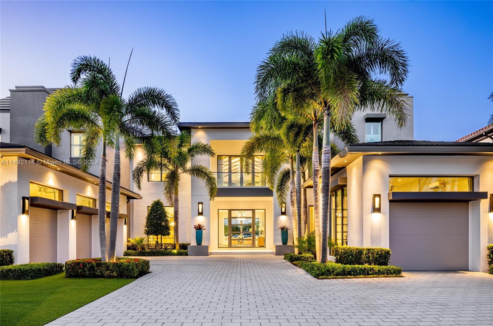 169 West Key Palm Road Boca Raton, FL 33432 - Photo 2 of 27 front view of a house with a yard