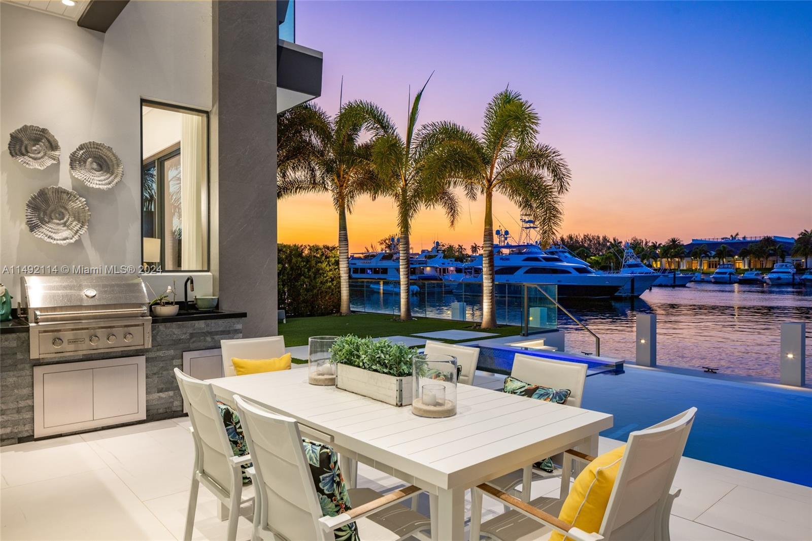 169 West Key Palm Road Boca Raton, FL 33432 - Photo 23 of 27 a view of a dinning table and chairs in the patio