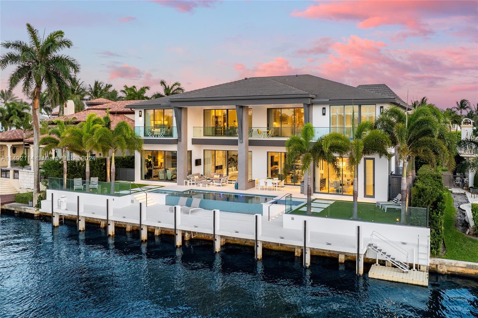 169 West Key Palm Road Boca Raton, FL 33432 - Photo 27 of 27 a view of a house with a yard and sitting area