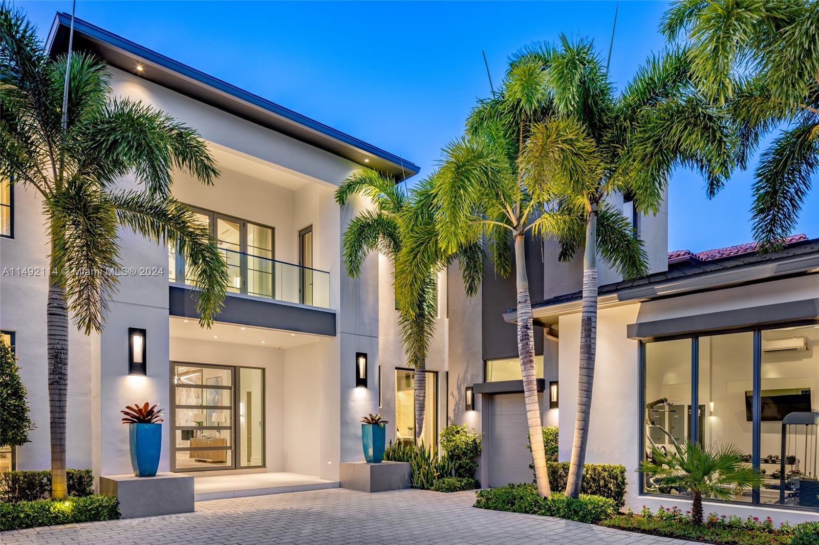 169 West Key Palm Road Boca Raton, FL 33432 - Photo 4 of 27 a view of a building with a palm tree