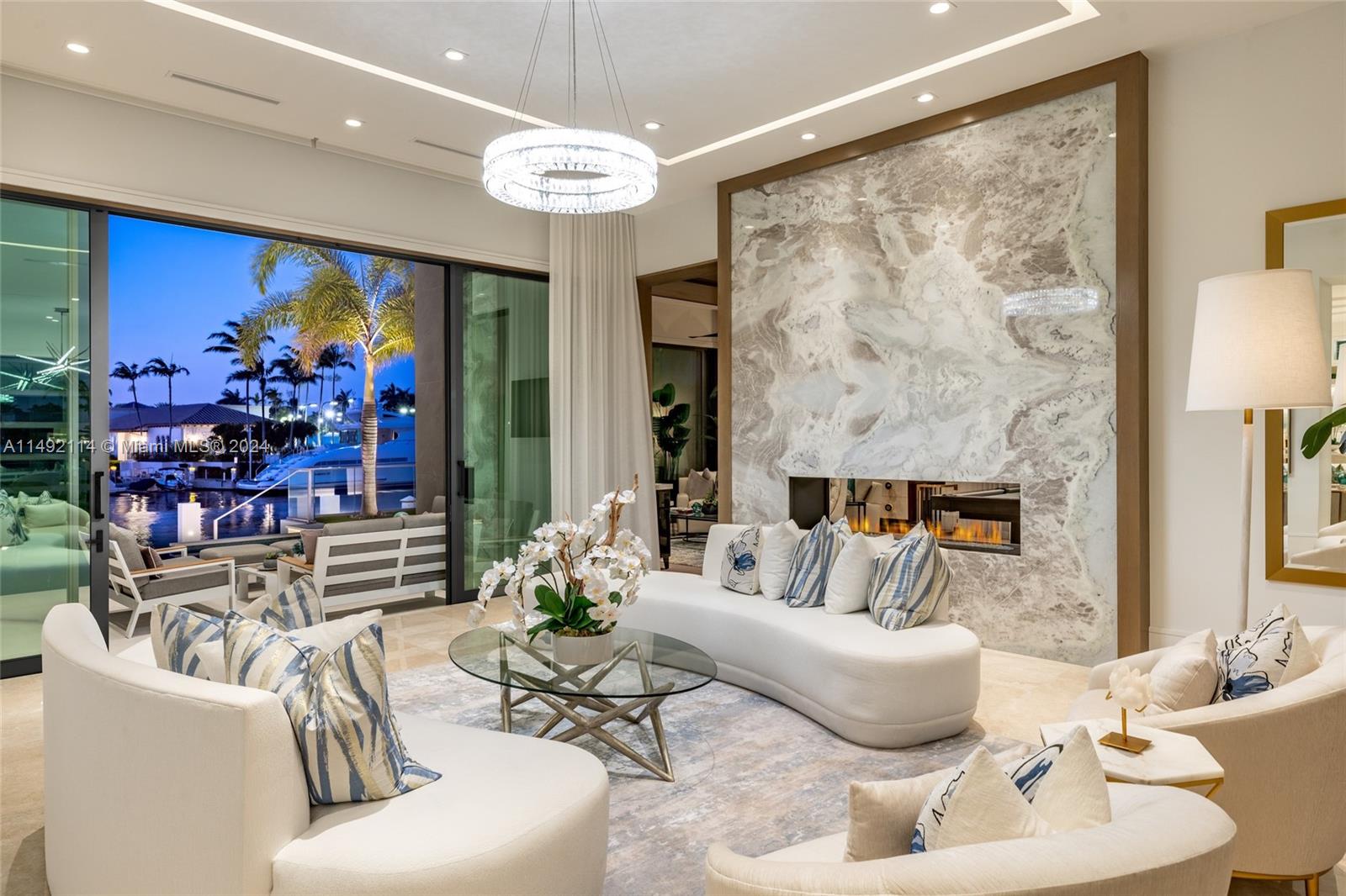 169 West Key Palm Road Boca Raton, FL 33432 - Photo 5 of 27 a living room with furniture and a large window