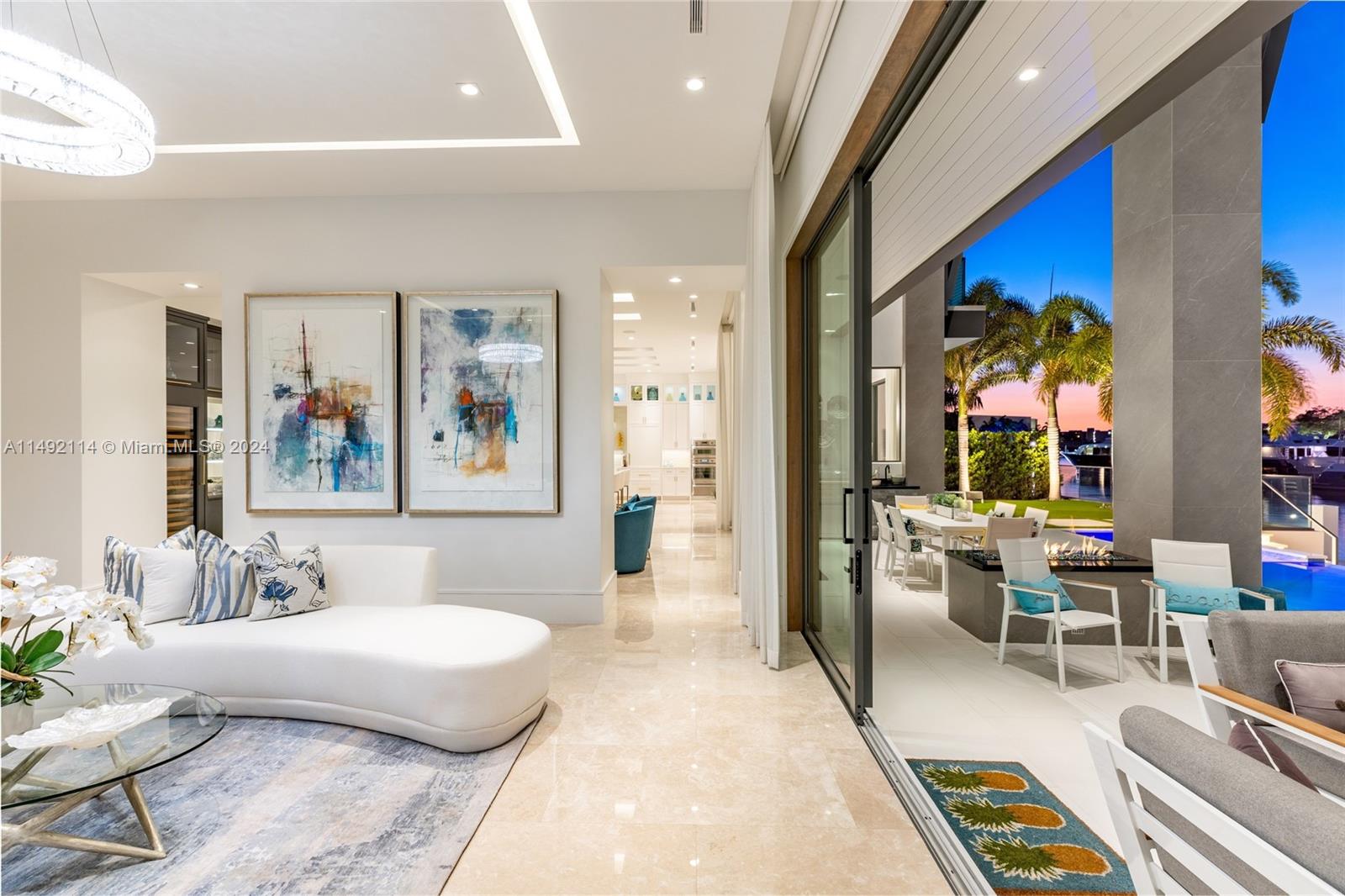 169 West Key Palm Road Boca Raton, FL 33432 - Photo 6 of 27 a living room with furniture and a rug