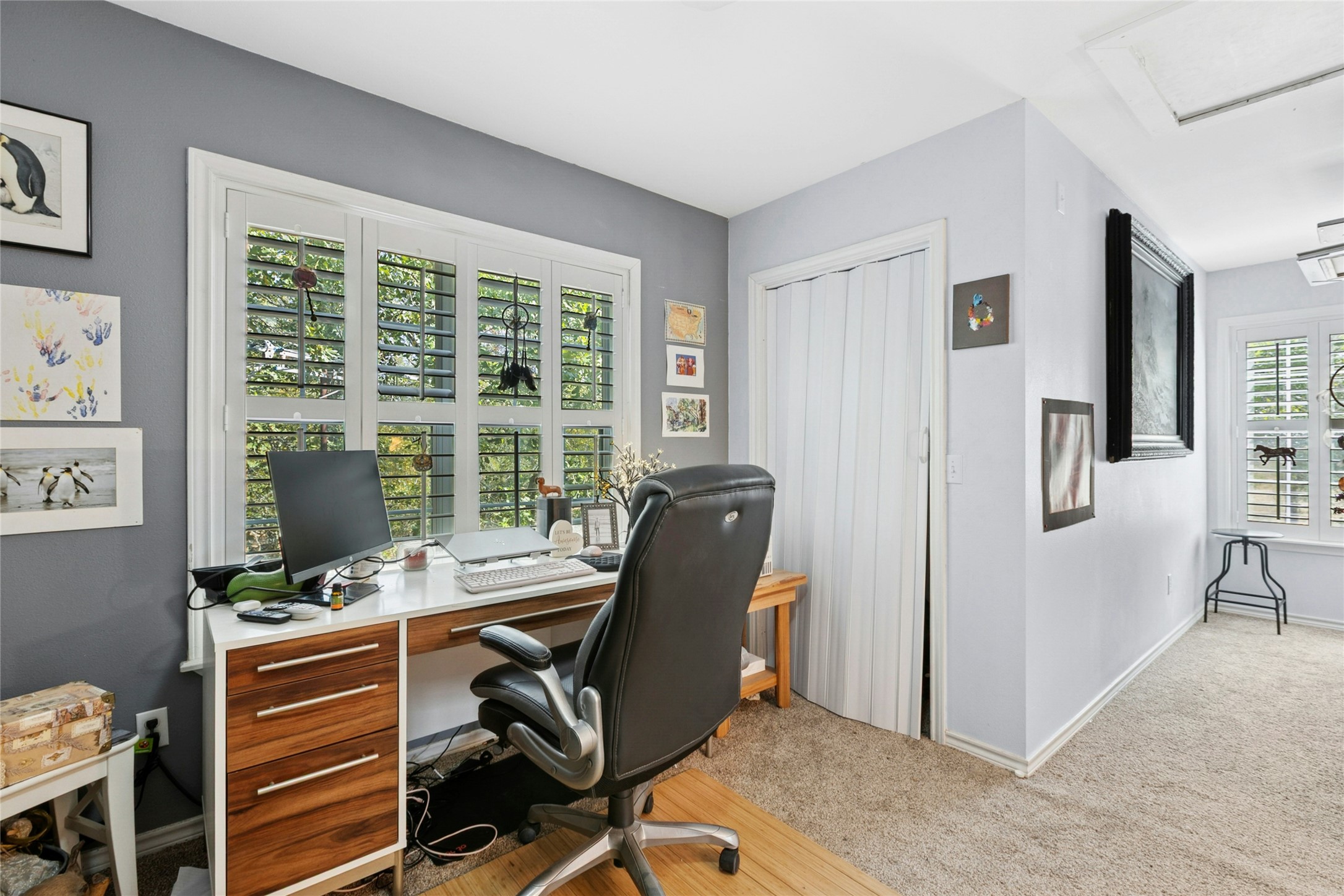 412 Woody Hollow Road Luling, TX 78648 - Photo 18 of 33 Home office with light colored carpet and baseboards