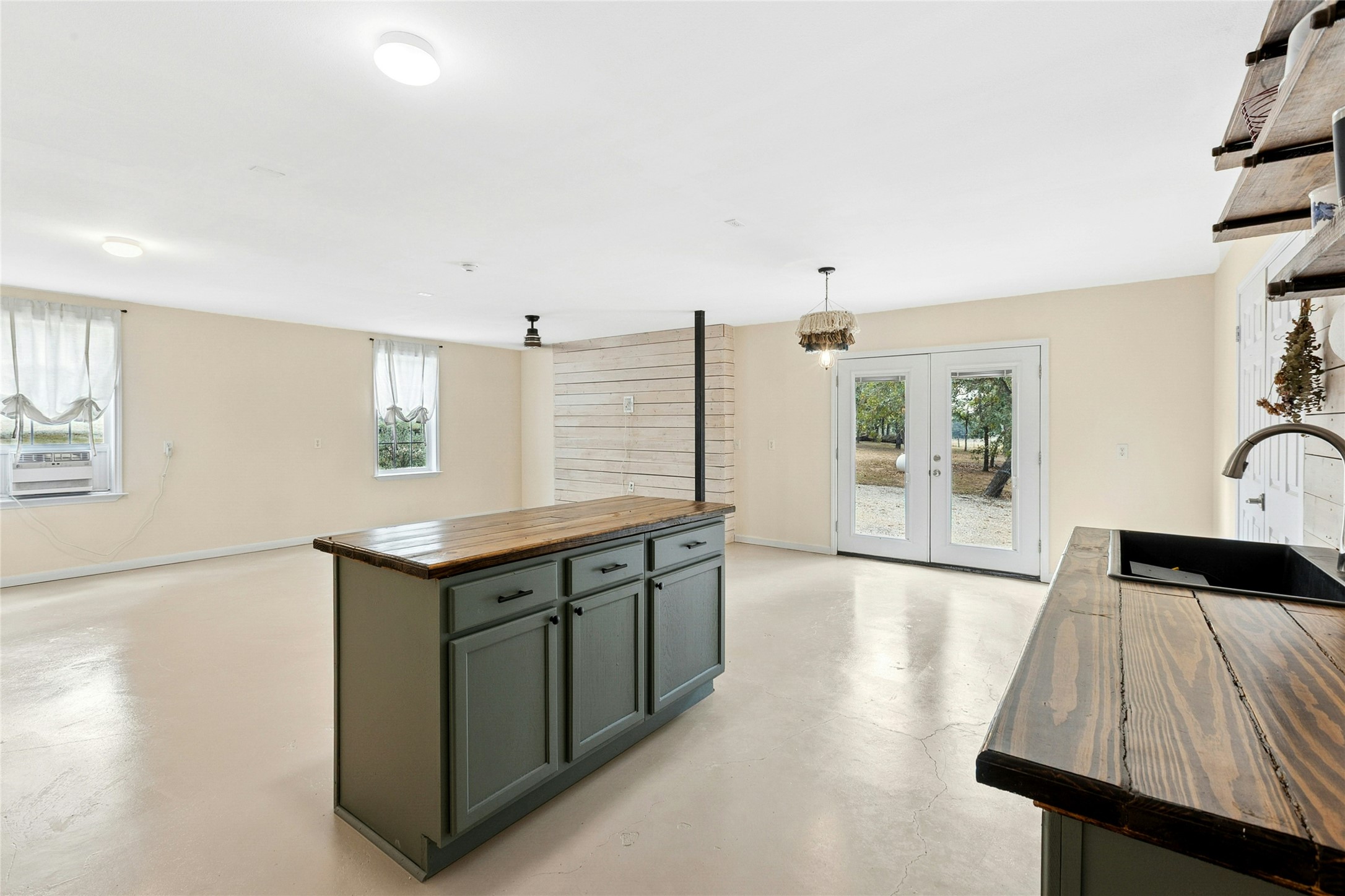 412 Woody Hollow Road Luling, TX 78648 - Photo 22 of 33 Guest house open kitchen, dining, and living room