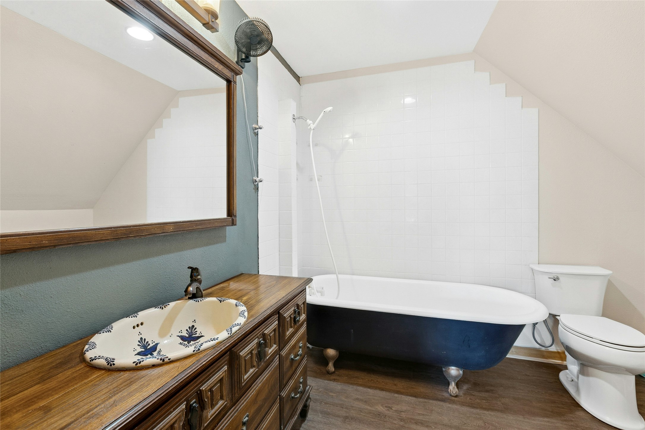 412 Woody Hollow Road Luling, TX 78648 - Photo 24 of 33 Guest house bathroom featuring antique vanity & claw foot tub