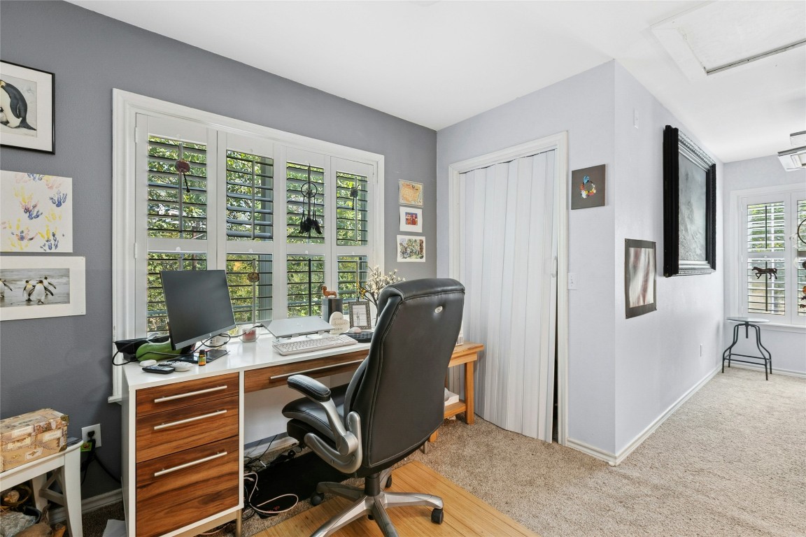 412 Woody Hollow Road Luling, TX 78648 - Photo 24 of 39 a view of a workspace with furniture and a window