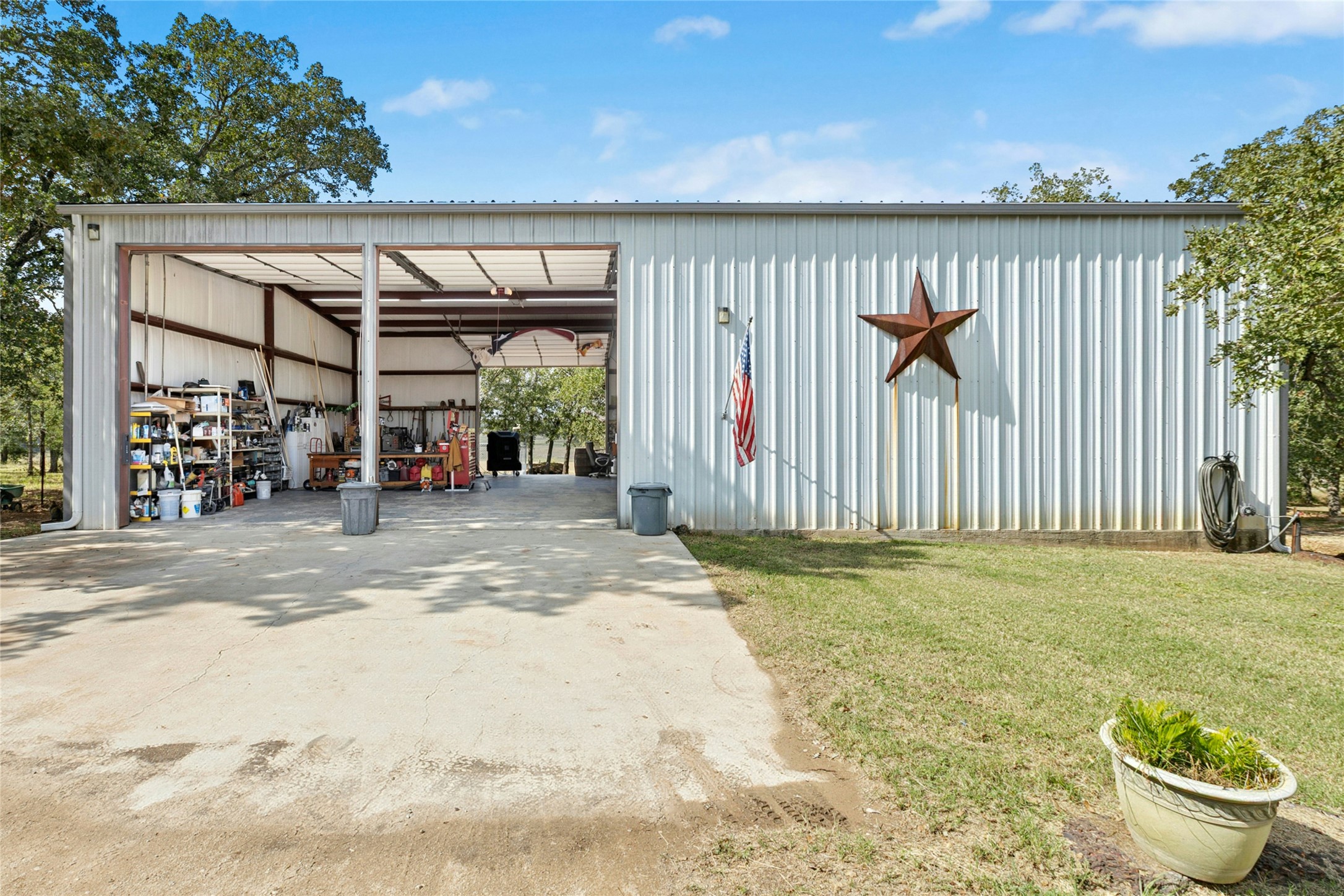 412 Woody Hollow Road Luling, TX 78648 - Photo 5 of 33 60'x30' Garage/ Workshop with Full Bath, Washer & Dryer