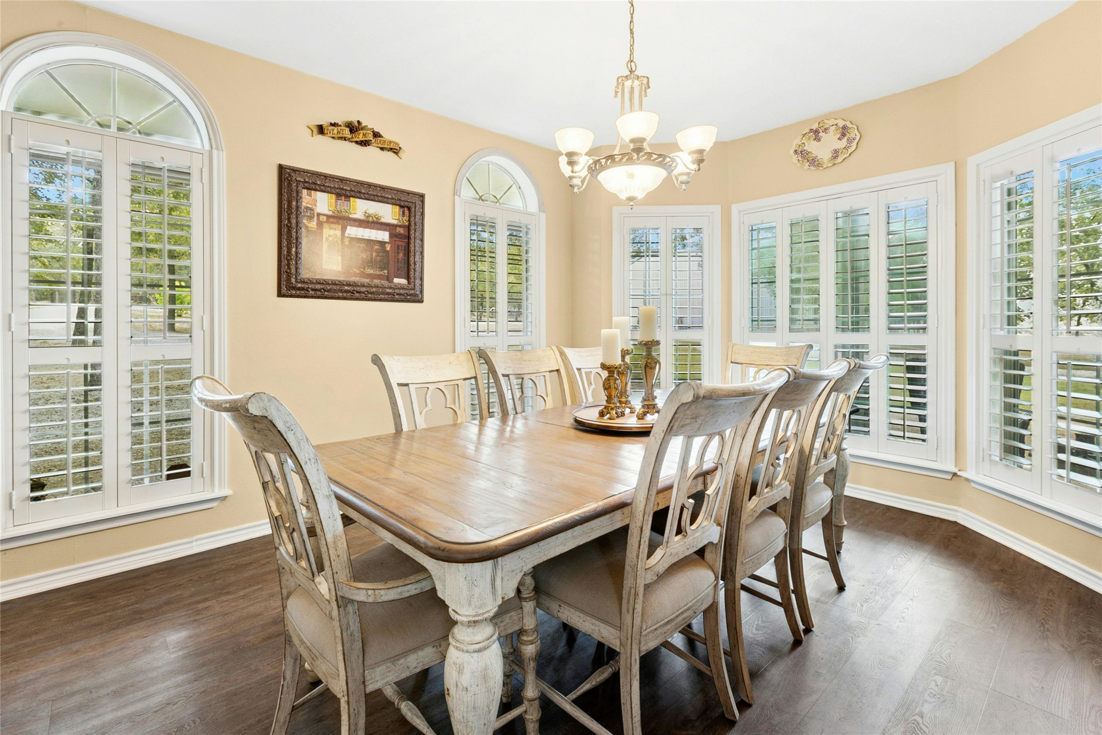 412 Woody Hollow Road Luling, TX 78648 - Photo 9 of 33 Dining room with dark style flooring and a chandelier
