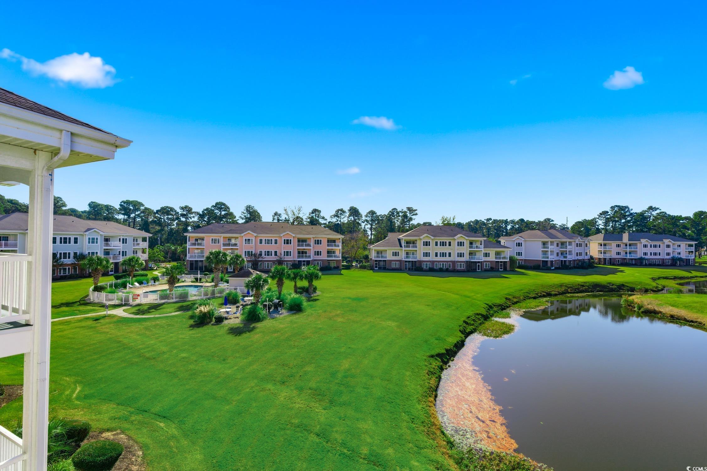 4839 Carnation Circle, Unit 305 Myrtle Beach, SC 29577 - Photo 18 of 24 Aerial view of residential area with a nearby body of water