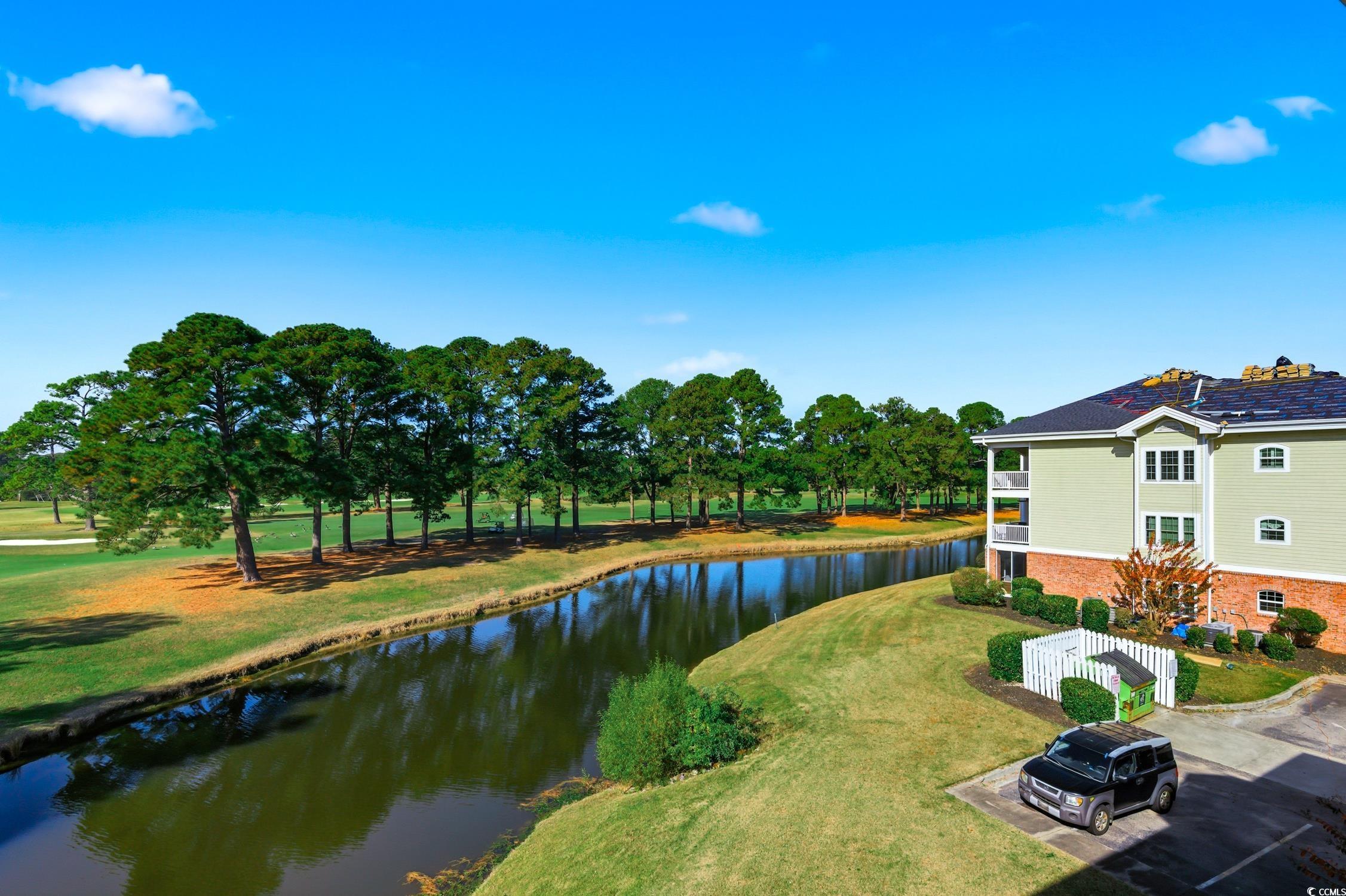 4839 Carnation Circle, Unit 305 Myrtle Beach, SC 29577 - Photo 21 of 24 Water view featuring a tree filled landscape