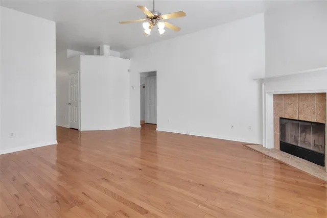 a backyard of a house with a garden and plants