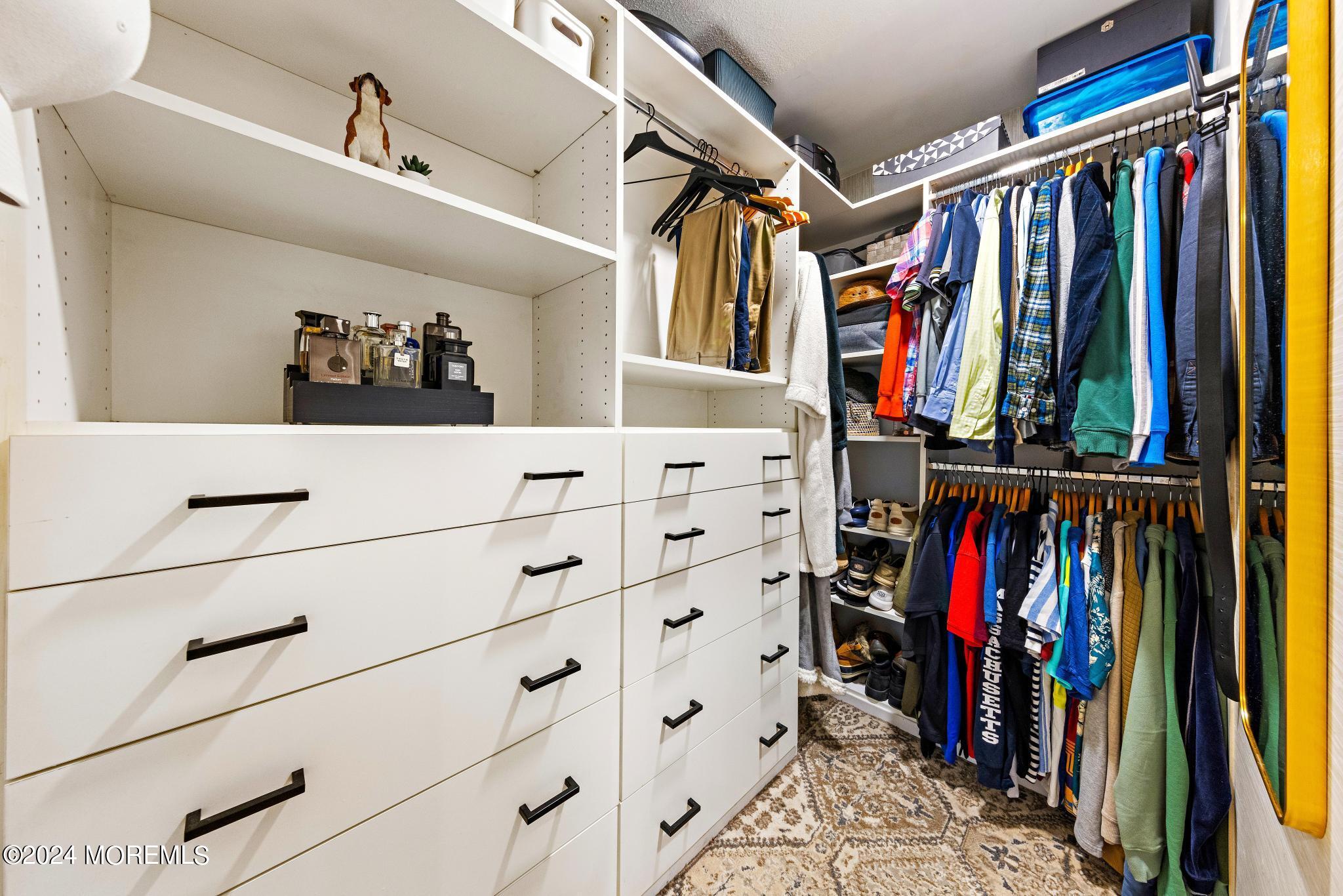 14 Seaton Road Toms River, NJ 08755 - Photo 28 of 59 a view of walk in closet with clothes and shoes