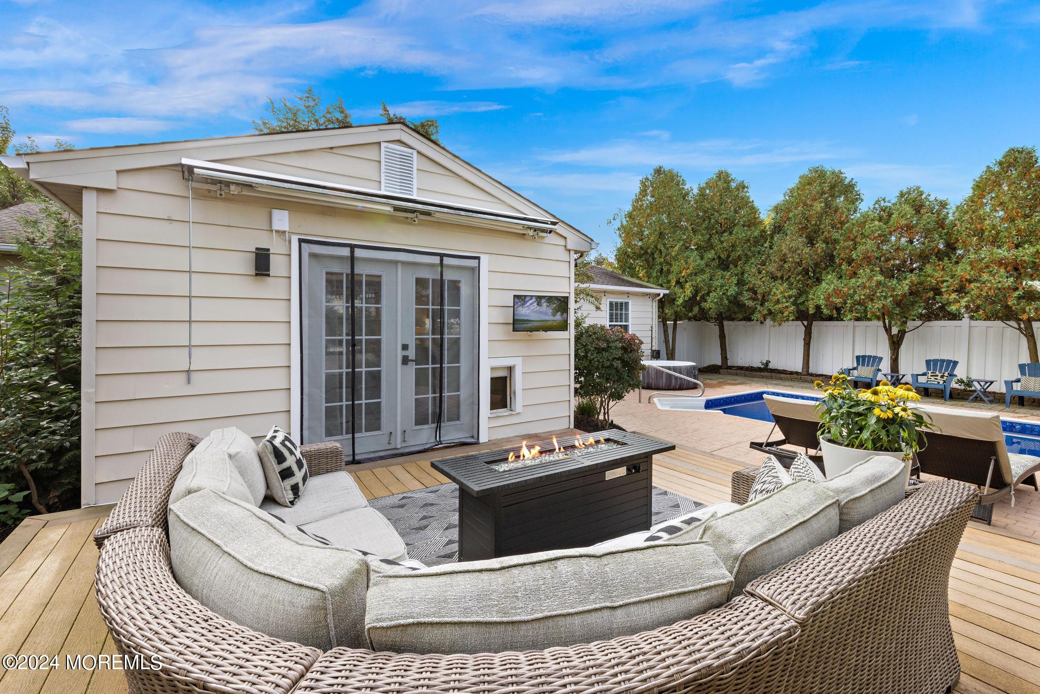 14 Seaton Road Toms River, NJ 08755 - Photo 35 of 59 a view of a couches and dinning table and chairs in patio