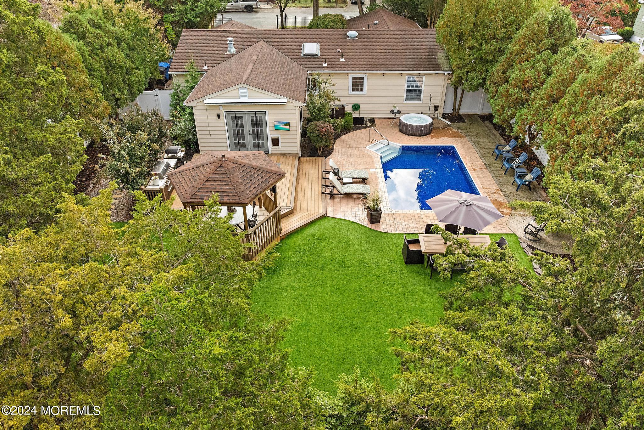 14 Seaton Road Toms River, NJ 08755 - Photo 47 of 59 an aerial view of a house with swimming pool garden and patio