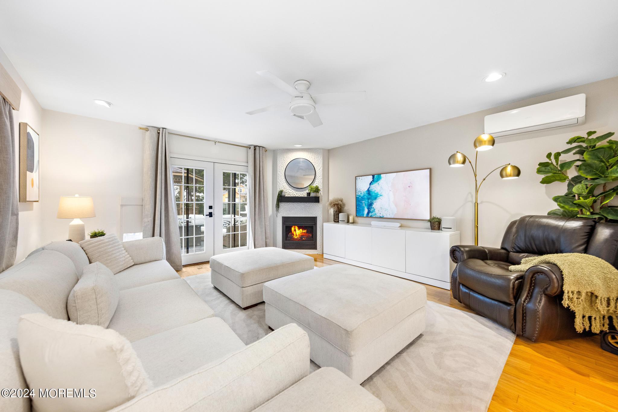 14 Seaton Road Toms River, NJ 08755 - Photo 8 of 59 a living room with furniture and a fireplace