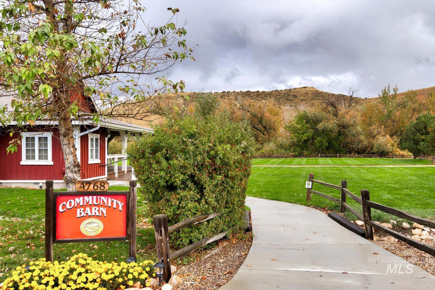 5855 West Farm Mkt Road Garden City, ID 83714 - Photo 48 of 50 Surrounding community featuring a lawn and a mountain view