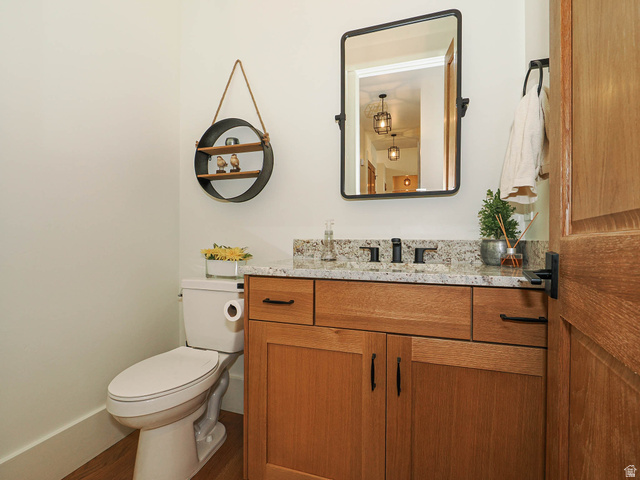 3167 South Mapleton Estates Drive Mapleton, UT 84664 - Photo 20 of 42 Bathroom featuring vanity and wood finished floors