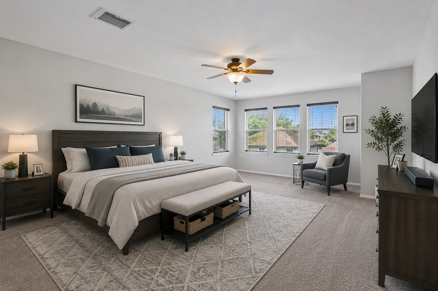 8804 Capitol View Drive Austin, TX 78747 - Photo 22 of 32 a spacious bedroom with a bed and a couch