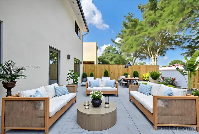a kitchen with refrigerator and window