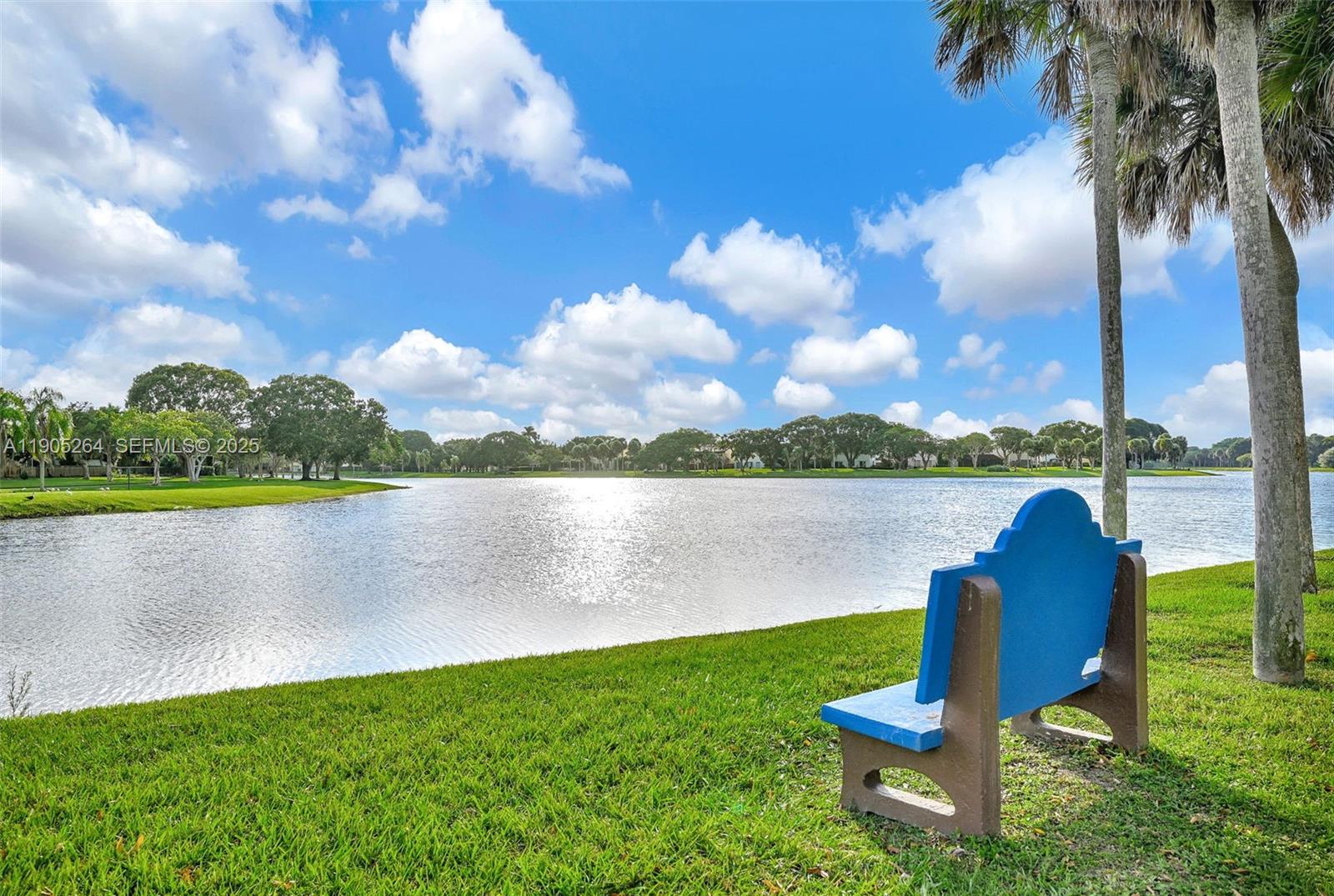 10823 Southwest 147th Court Miami, FL 33196 - Photo 14 of 100 a view of a lake with houses in the back