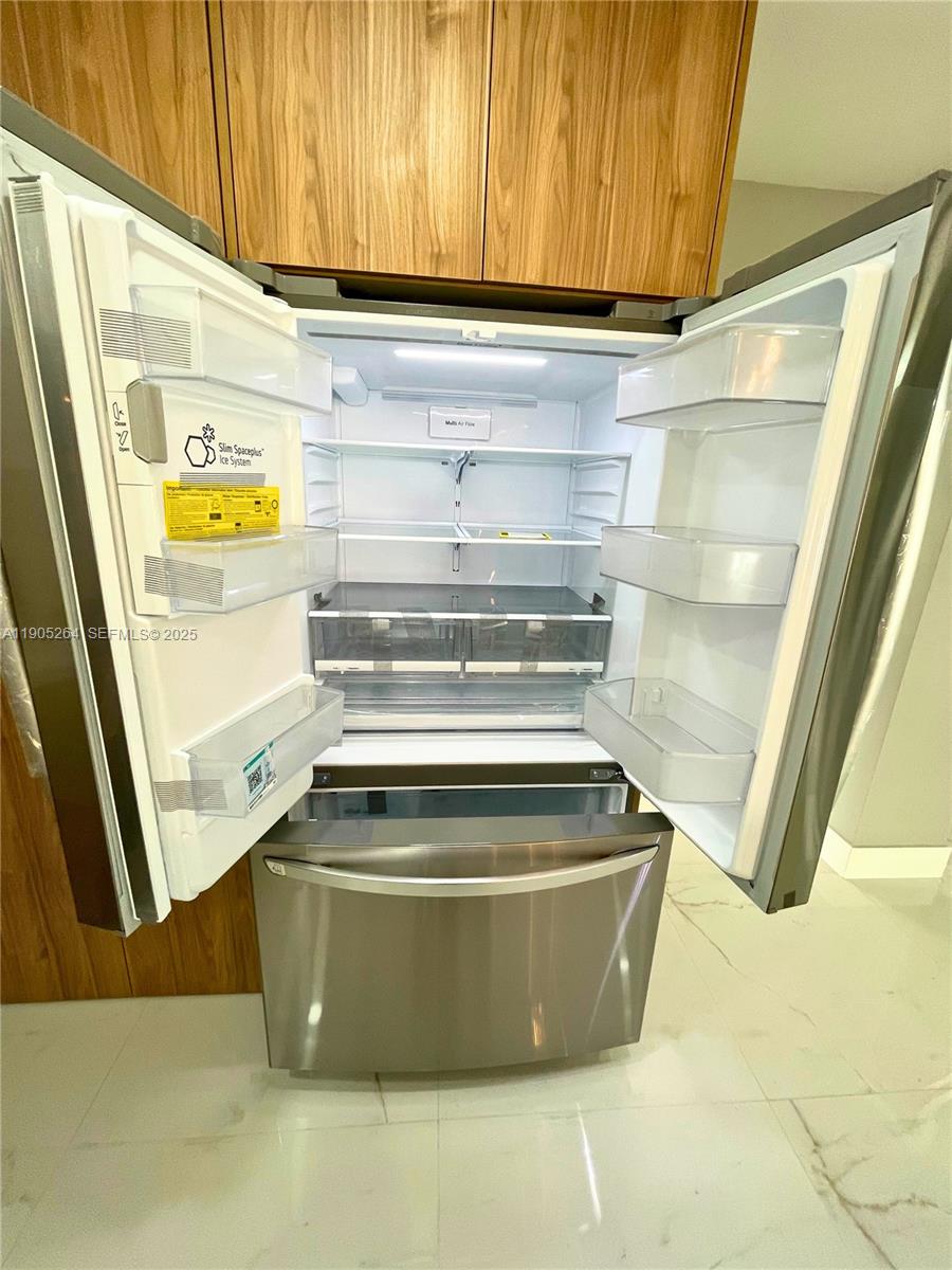 10823 Southwest 147th Court Miami, FL 33196 - Photo 35 of 100 a view of washer and dryer