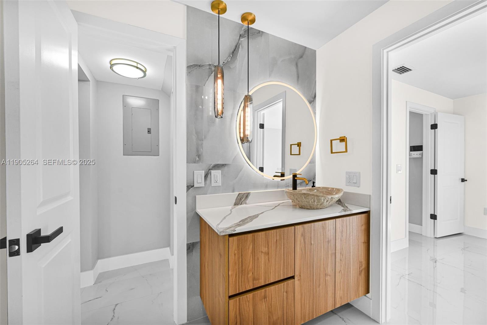 10823 Southwest 147th Court Miami, FL 33196 - Photo 46 of 100 a bathroom with a sink vanity granite tub and shower