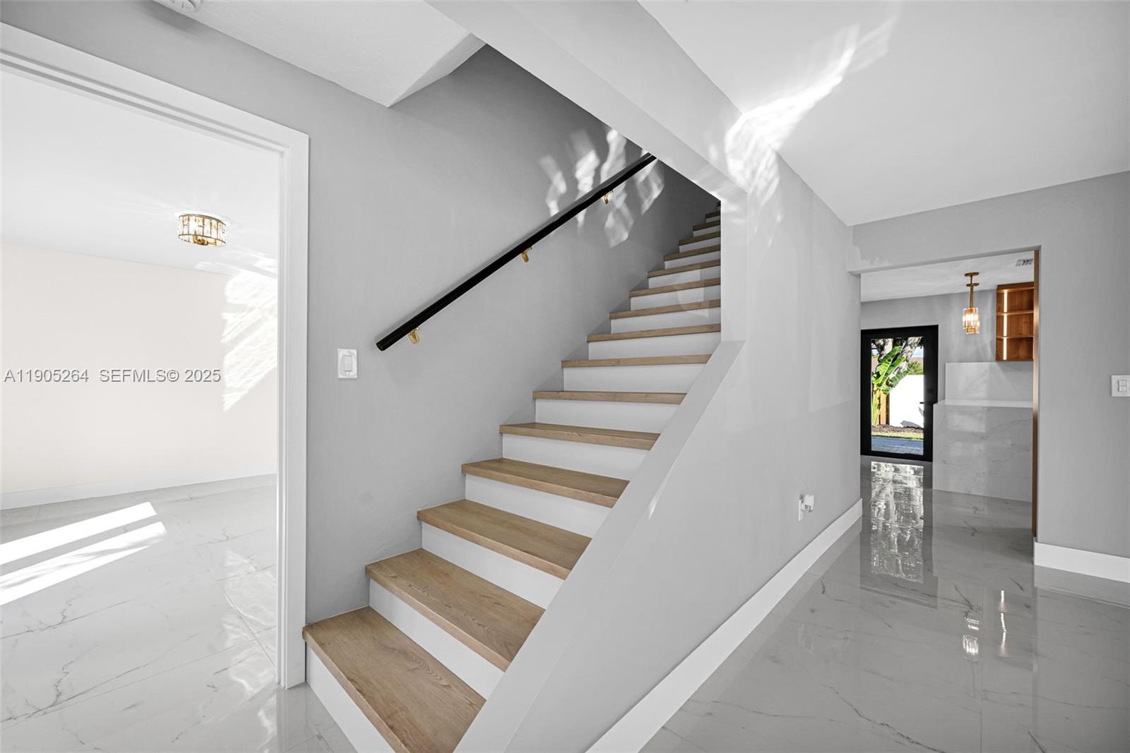 10823 Southwest 147th Court Miami, FL 33196 - Photo 52 of 100 a view of entryway and hall with wooden floor