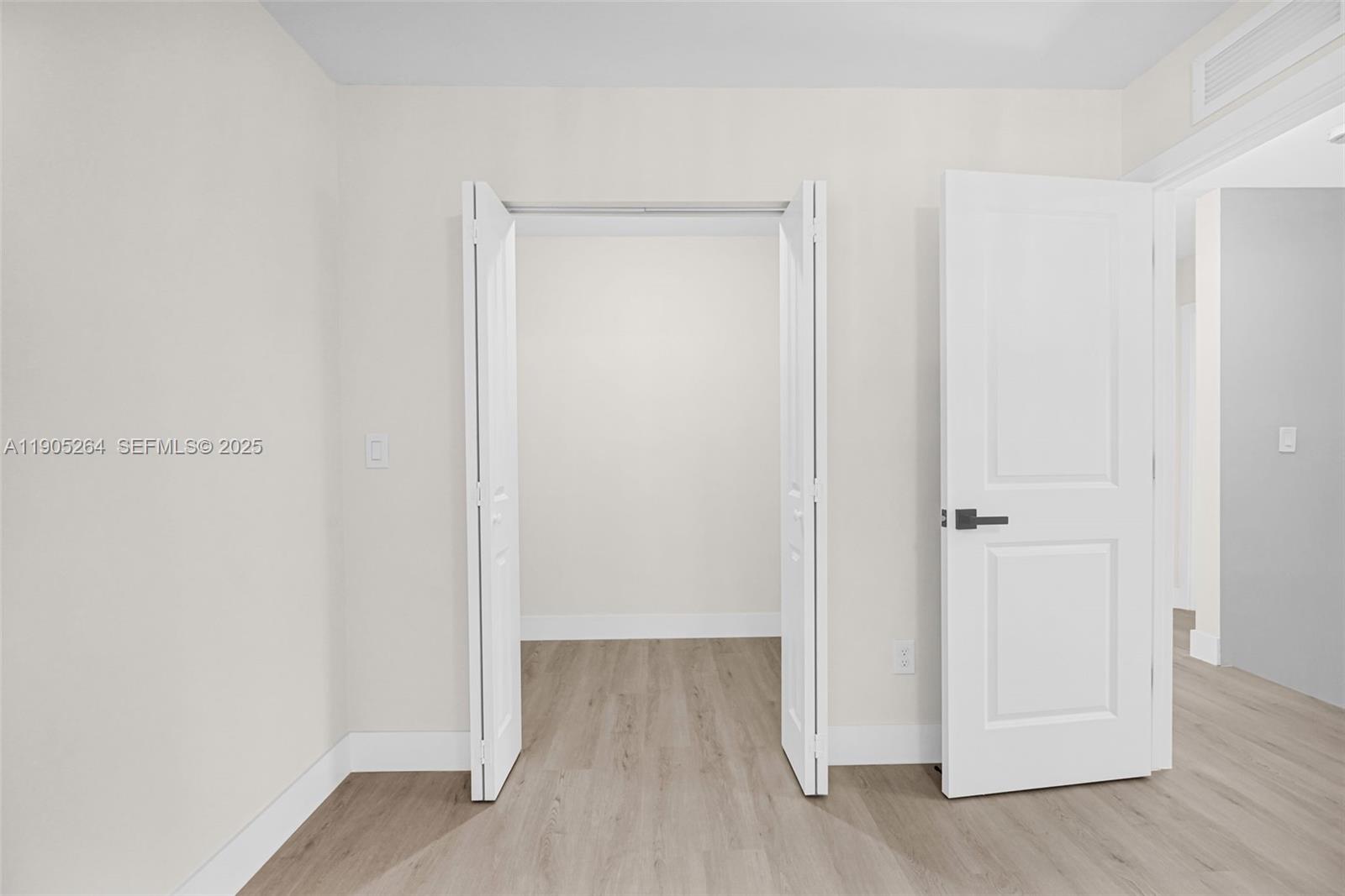 10823 Southwest 147th Court Miami, FL 33196 - Photo 60 of 100 a view of a room with wooden floor