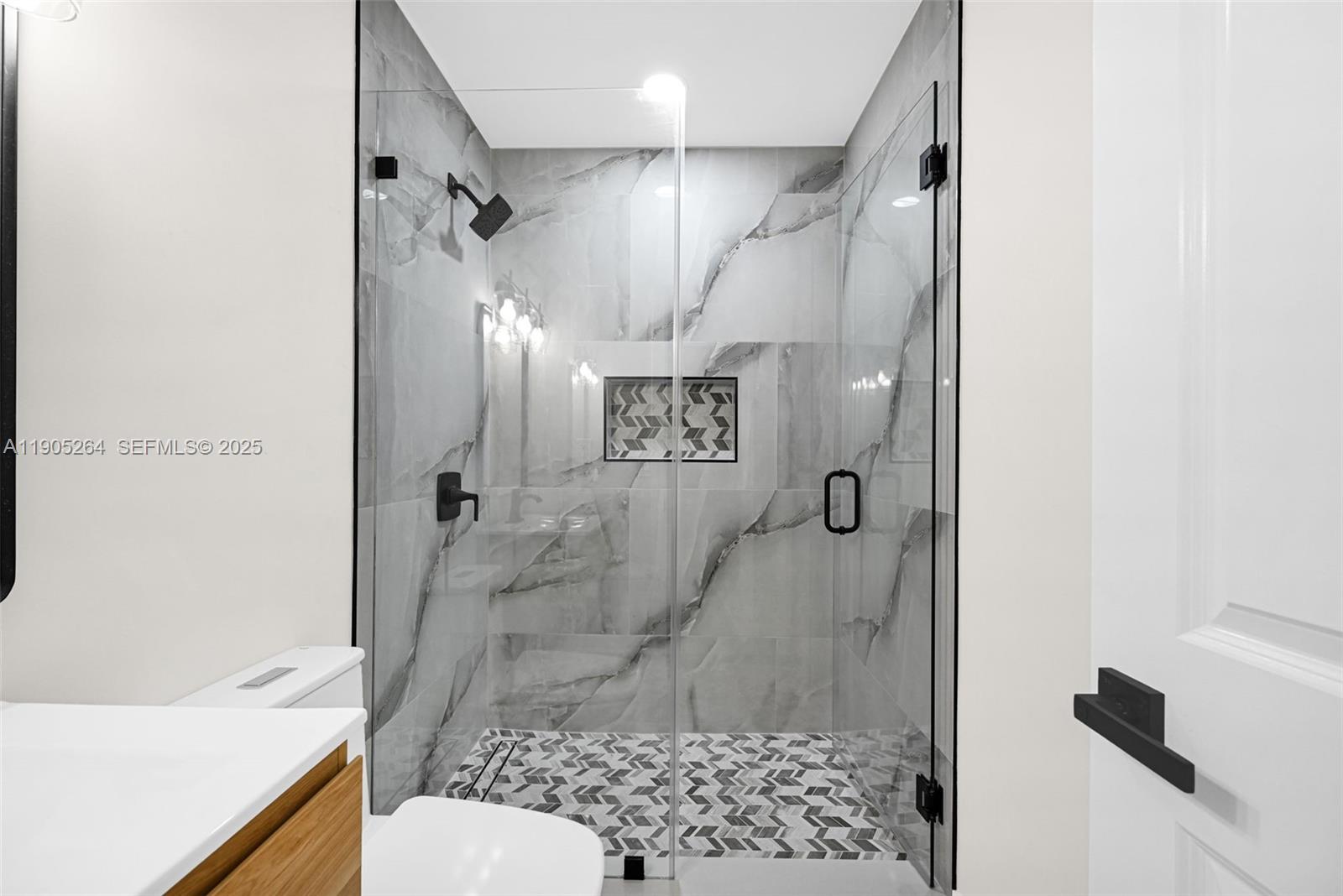 10823 Southwest 147th Court Miami, FL 33196 - Photo 62 of 100 a bathroom with a shower and a toilet